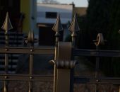 Brama z rozkutymi zawinięciami - detal